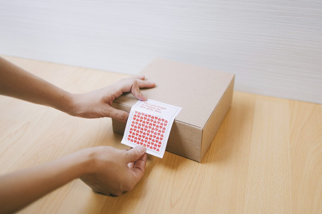 A box getting packaged.